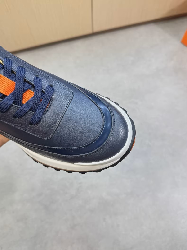 (Hermès) Bouncing sneakers.