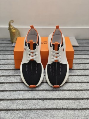 (Hermès) Bouncing sneakers.