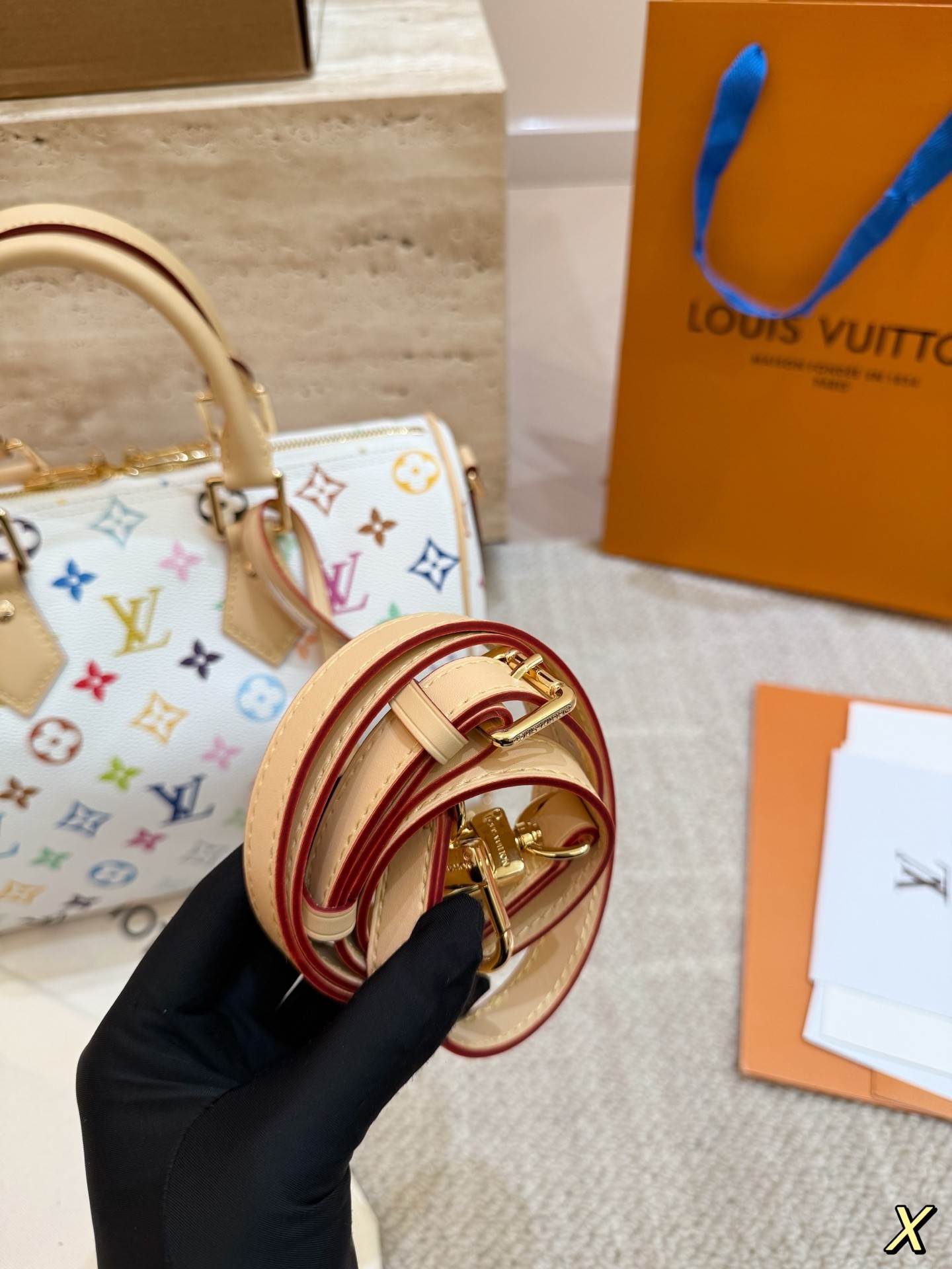 The limited-edition Speedy Bandoulière 25 from Louis Vuitton's collaboration with Japanese artist Takashi Murakami.