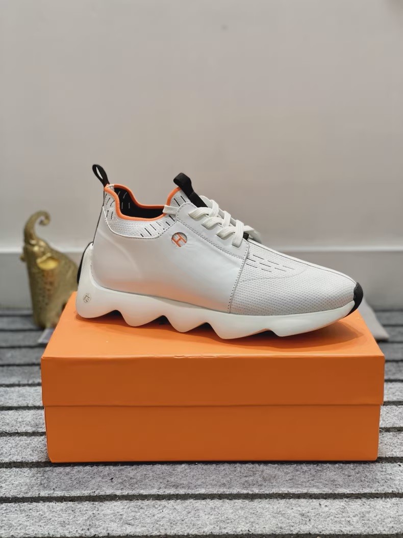 (Hermès) Bouncing sneakers.