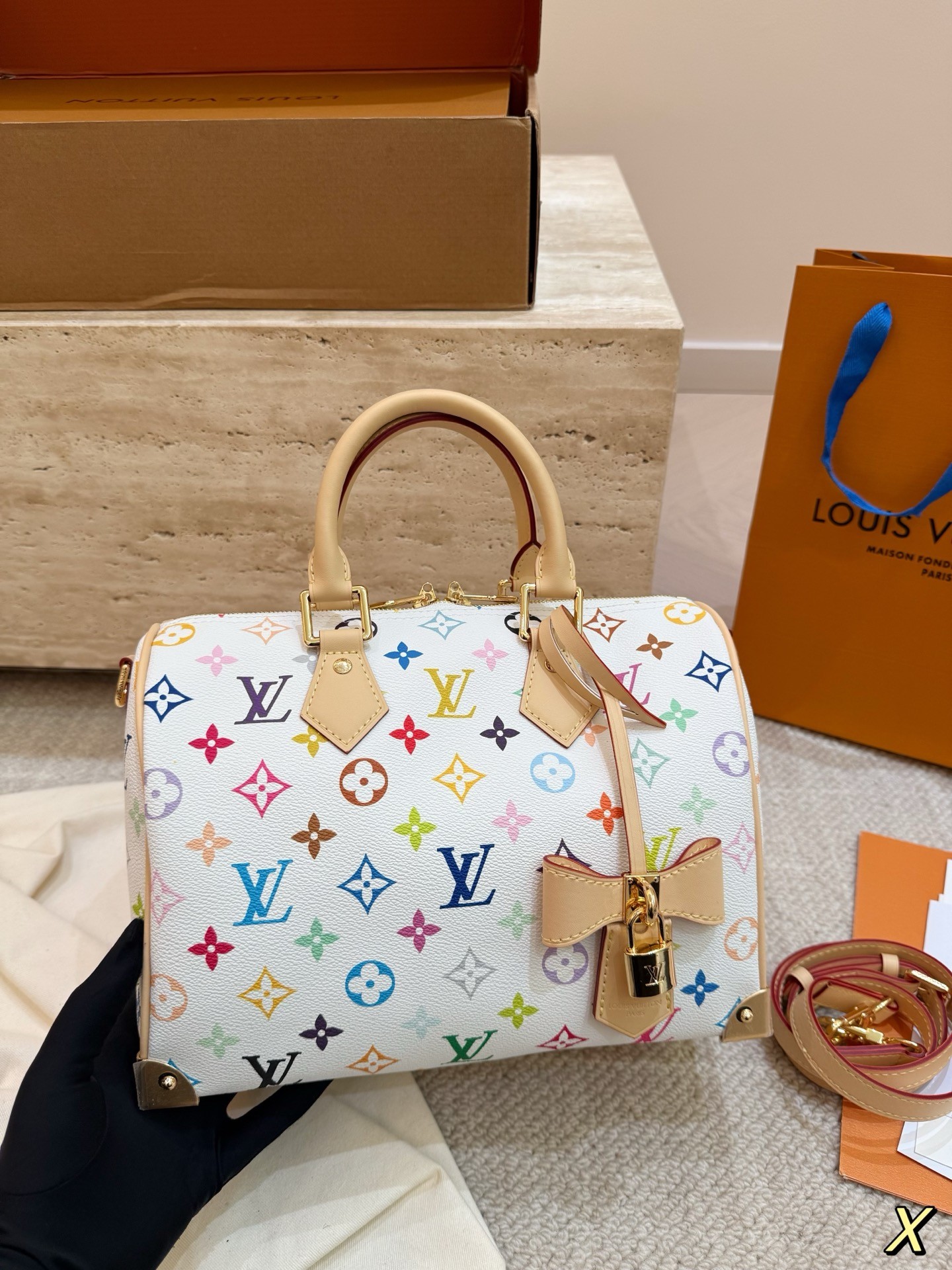 The limited-edition Speedy Bandoulière 25 from Louis Vuitton's collaboration with Japanese artist Takashi Murakami.