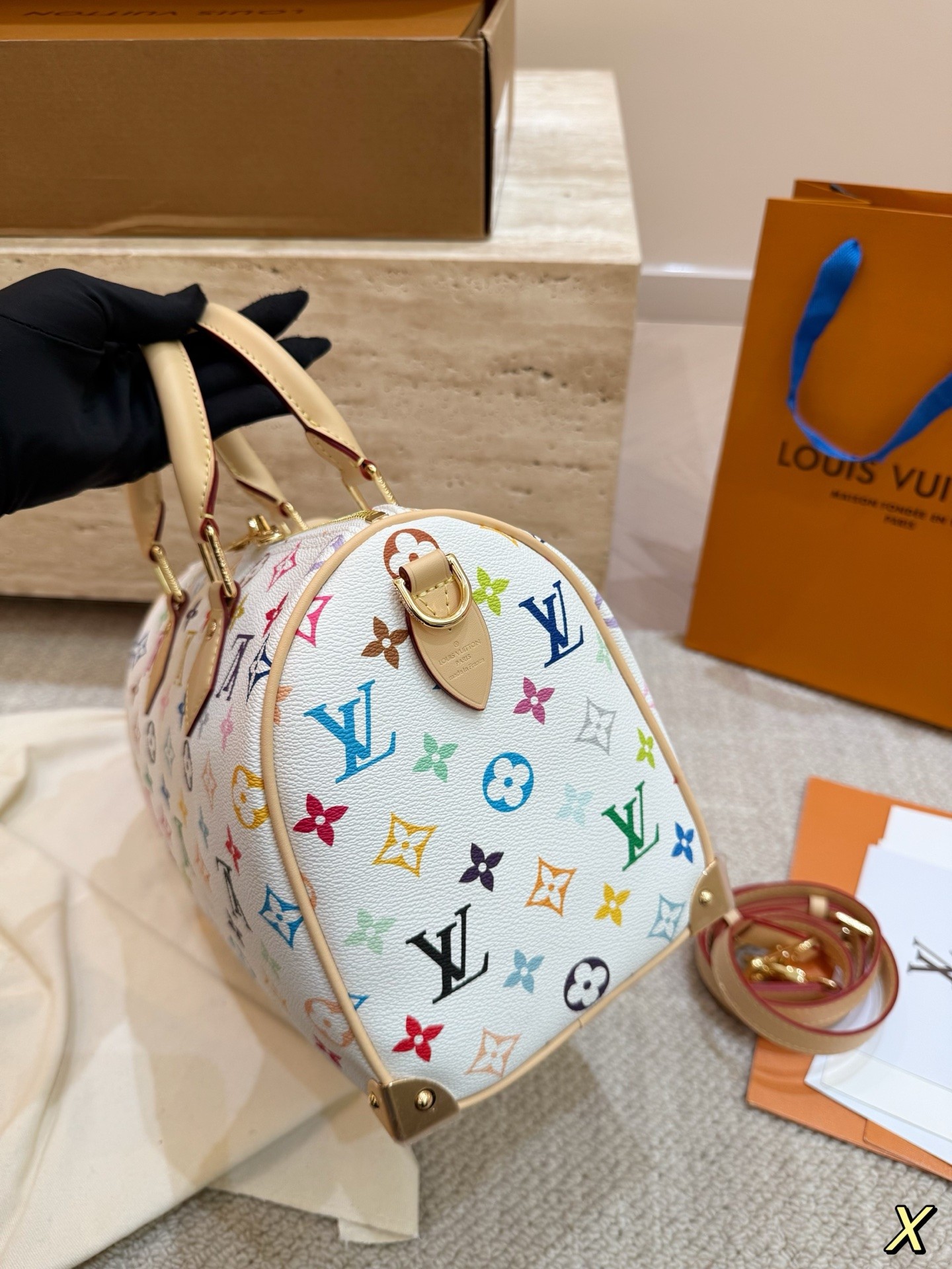 The limited-edition Speedy Bandoulière 25 from Louis Vuitton's collaboration with Japanese artist Takashi Murakami.