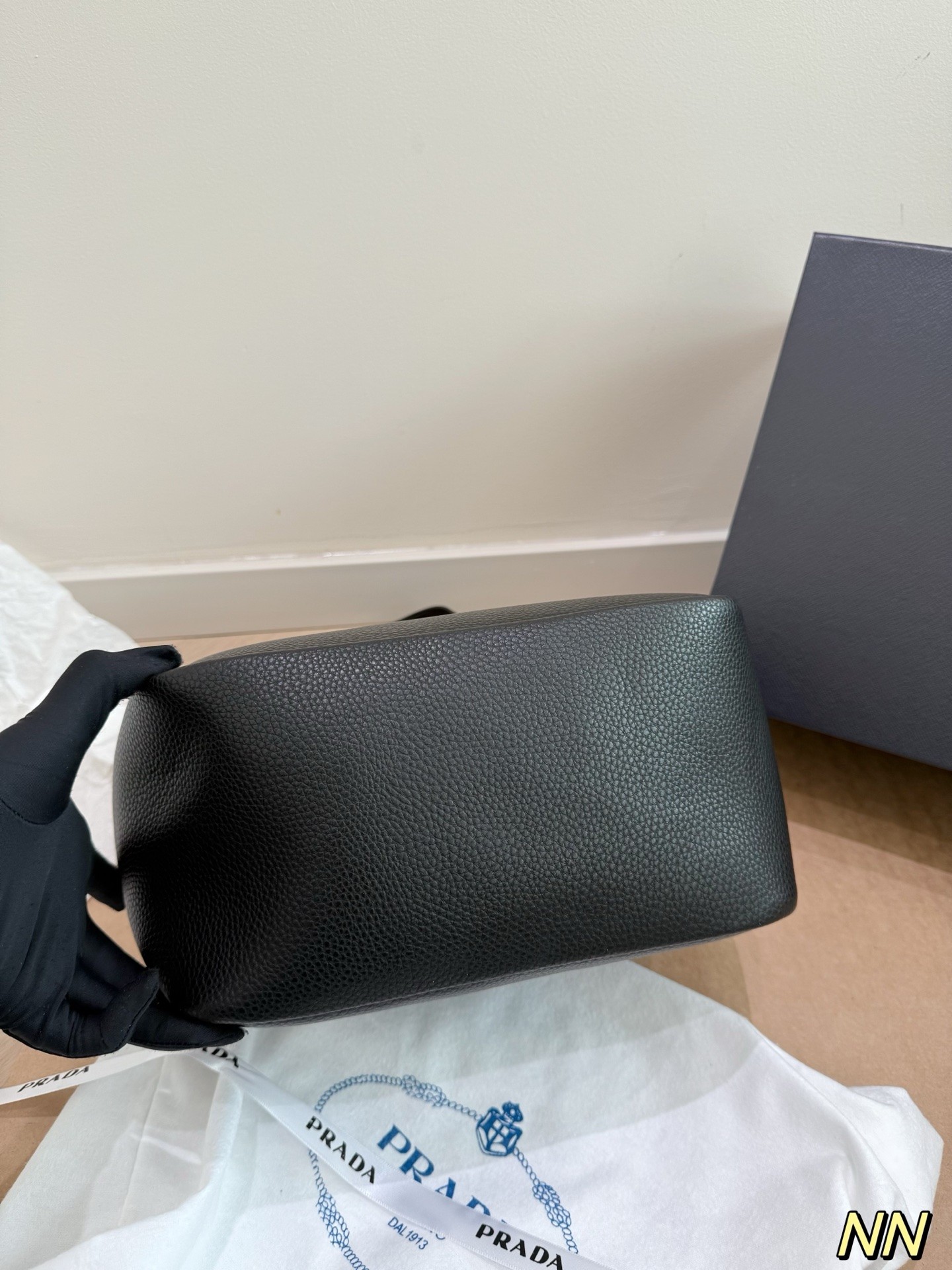 (Prada) black leather handbag