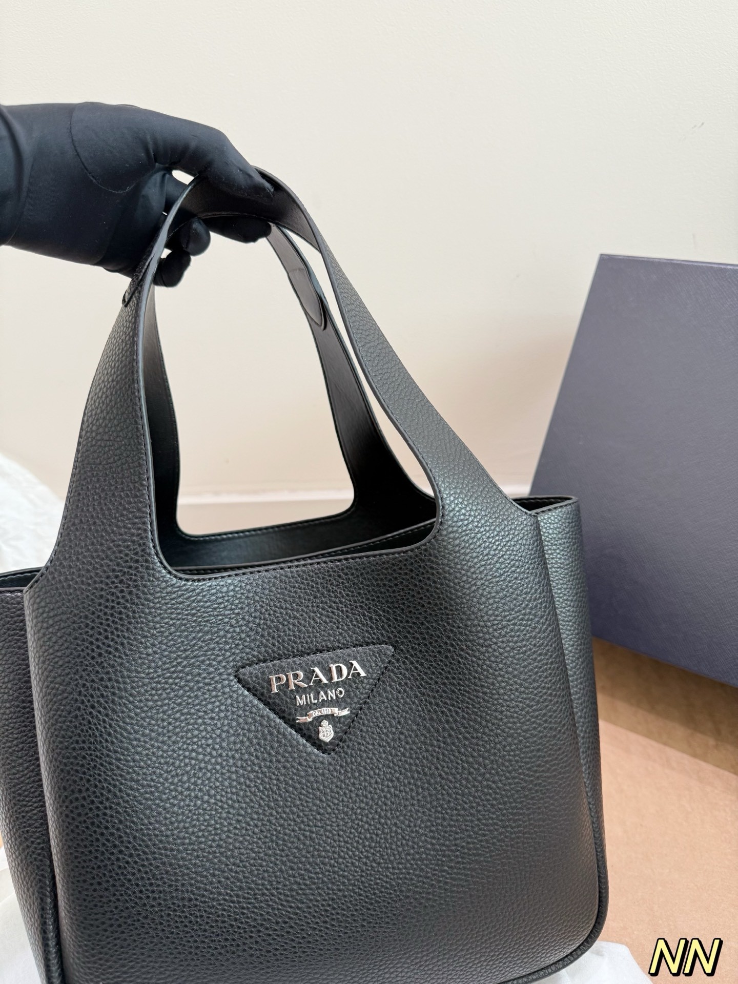 (Prada) black leather handbag