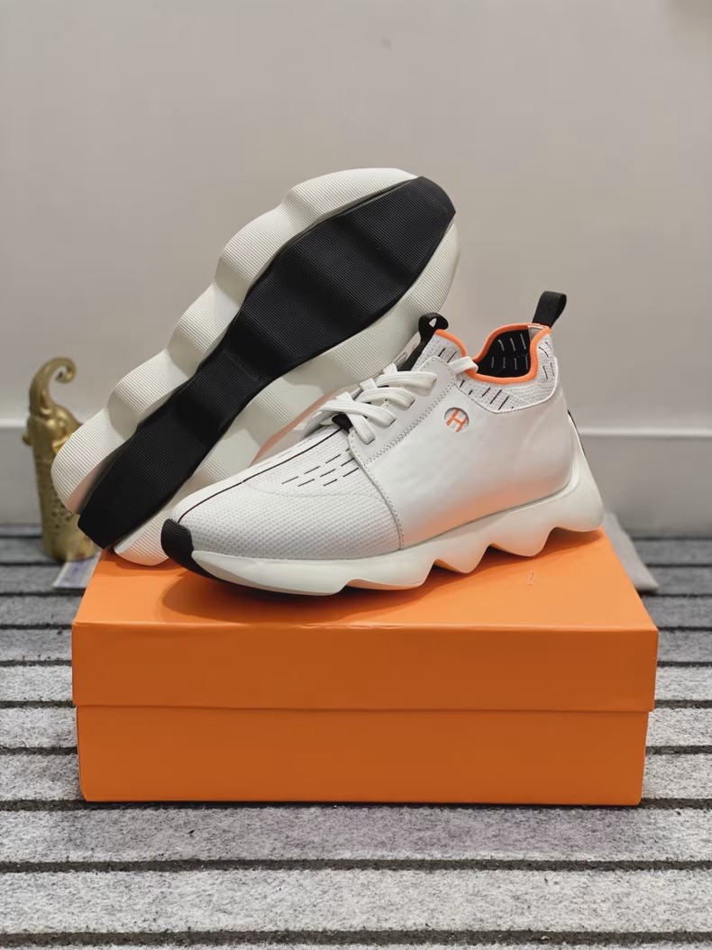 (Hermès) Bouncing sneakers.