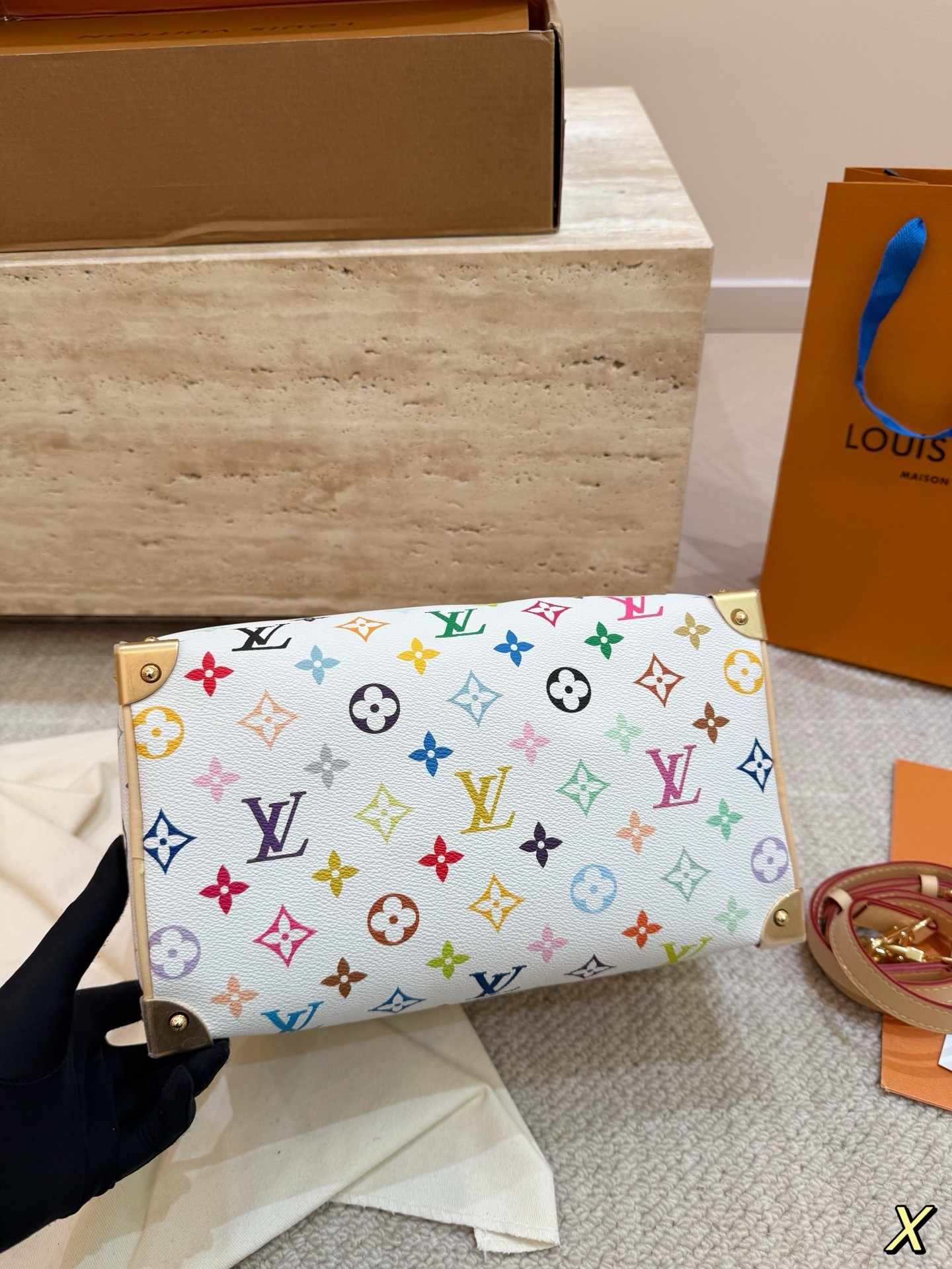 The limited-edition Speedy Bandoulière 25 from Louis Vuitton's collaboration with Japanese artist Takashi Murakami.