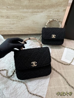 Sac à main en tweed noir à chaîne (Chanel)